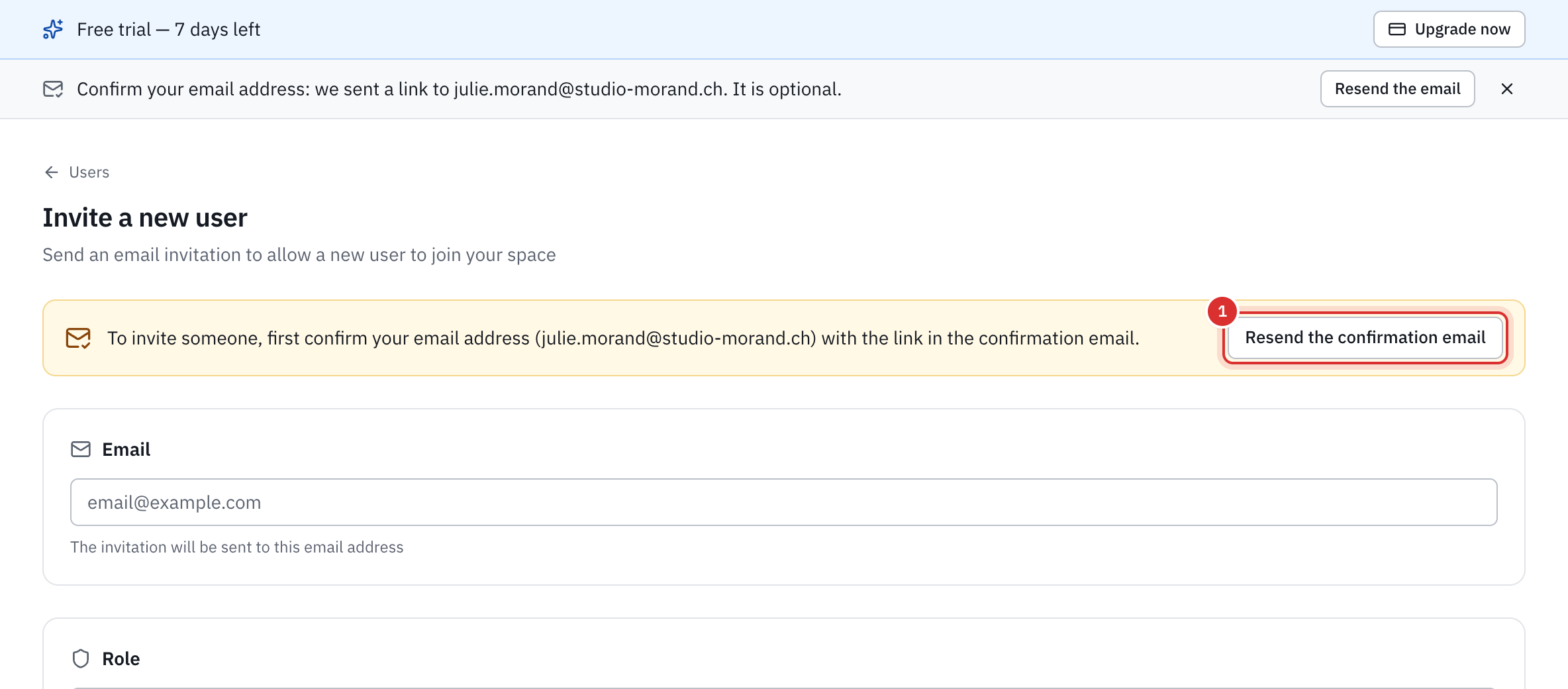 The Invite a new user page of an account whose address is not confirmed: the message To invite someone, first confirm your email address, with the Resend the confirmation email button.