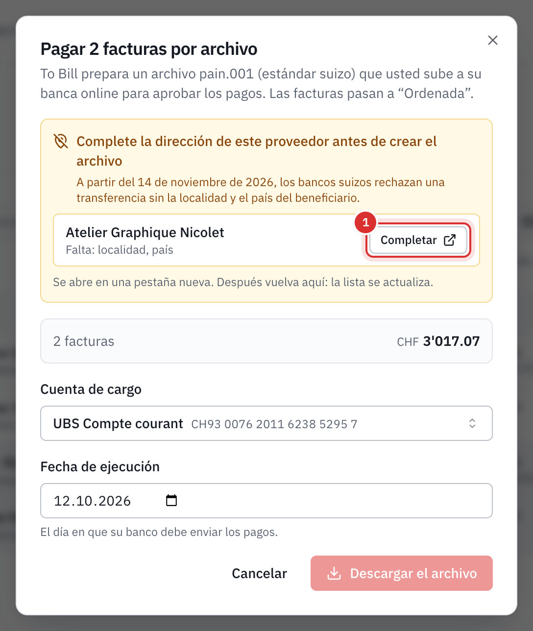 La ventana de pago con la alerta Complete la dirección de este proveedor antes de crear el archivo: Atelier Graphique Nicolet, falta la localidad y el país, con el botón Completar.